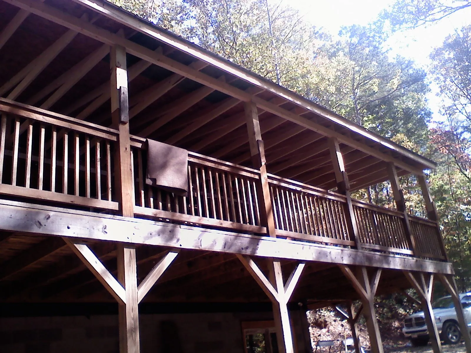 Timber framing under a new elevated porch and deck — Roof Leak Repair in Agate by Roofing Brothers
